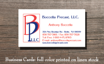 Full color business card printed on white linen